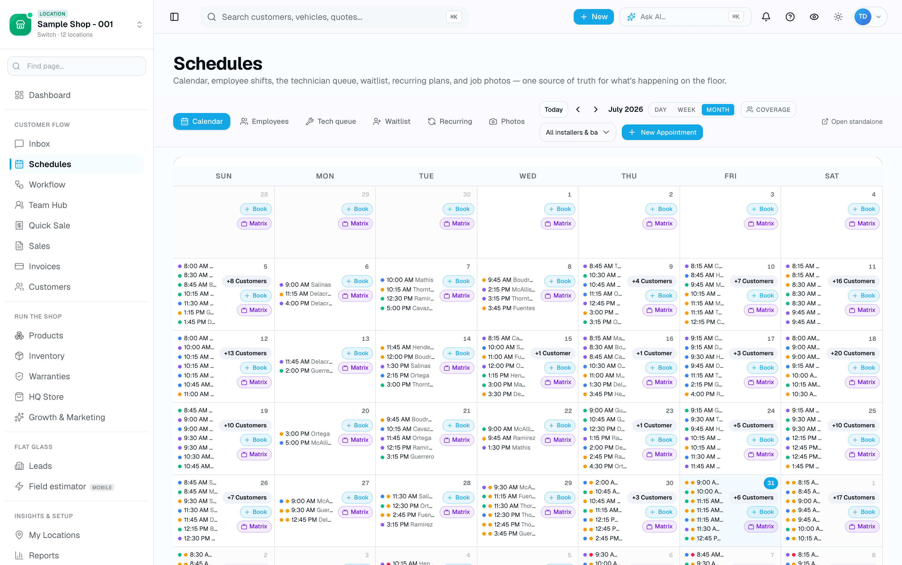 A real month at a packed shop — resource-colored appointments with one-tap Book and Sales Matrix entry on every day.