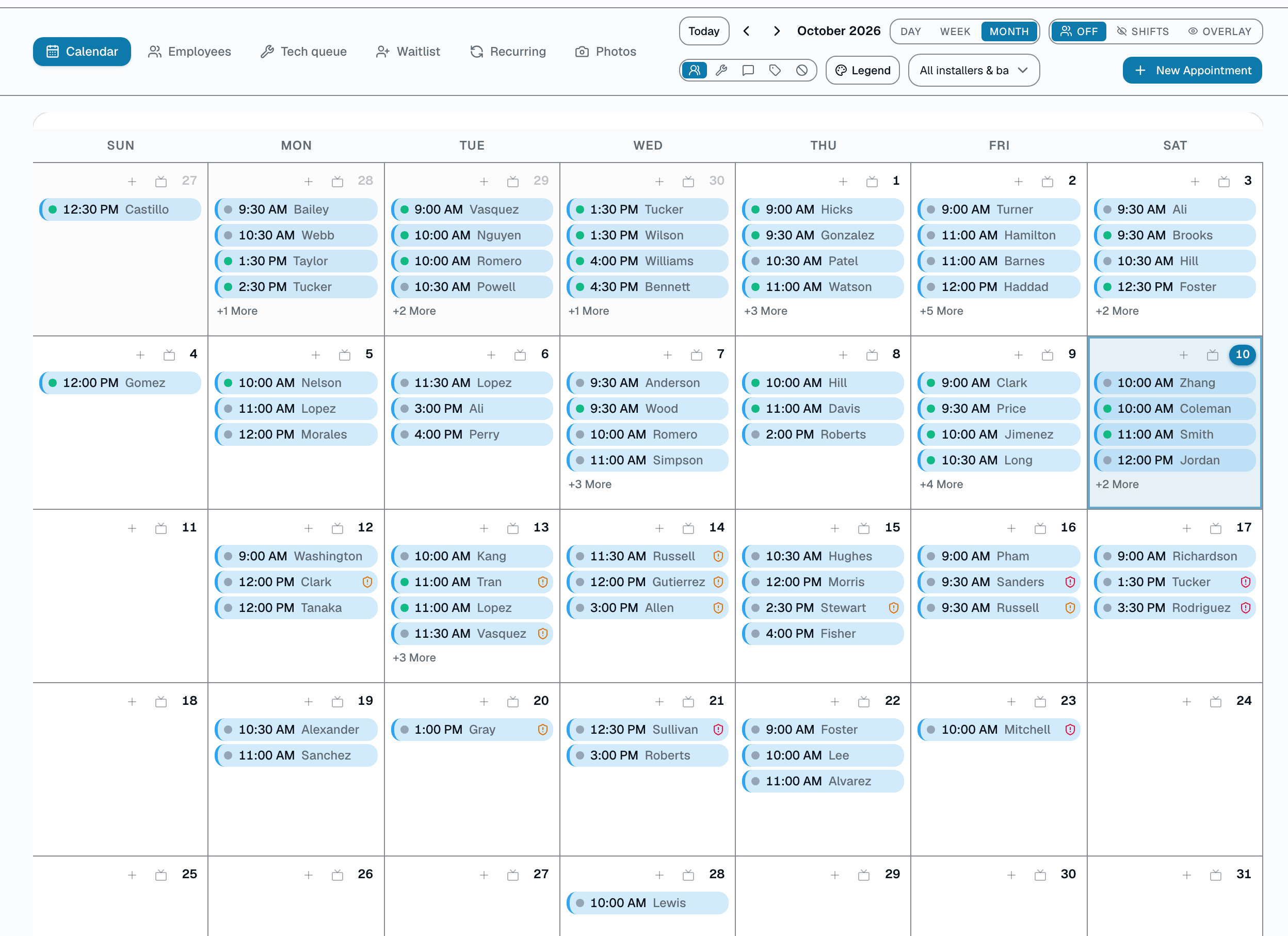 A real month at a packed shop — resource-colored appointments with one-tap Book and Sales Matrix entry on every day.