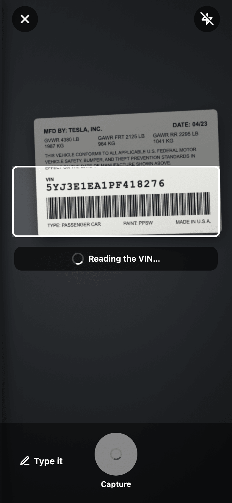 Most VIN labels carry a barcode next to the printed VIN, and the scanner reads it on the phone on every camera frame, so a clean label locks in about as fast as you can aim. Older or worn labels, and windshield plates without a barcode, are where the backup comes in: after a moment without a barcode, the app reads the printed characters from what's inside the frame.